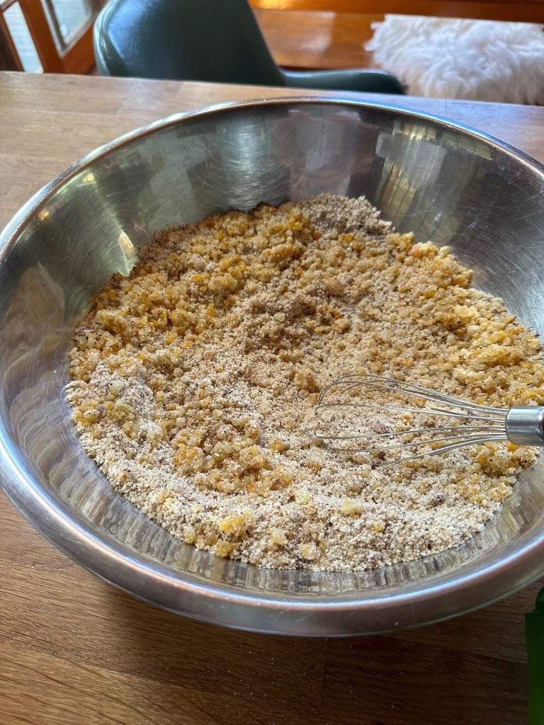 Peel and almond/hazelnut meal in a bowl